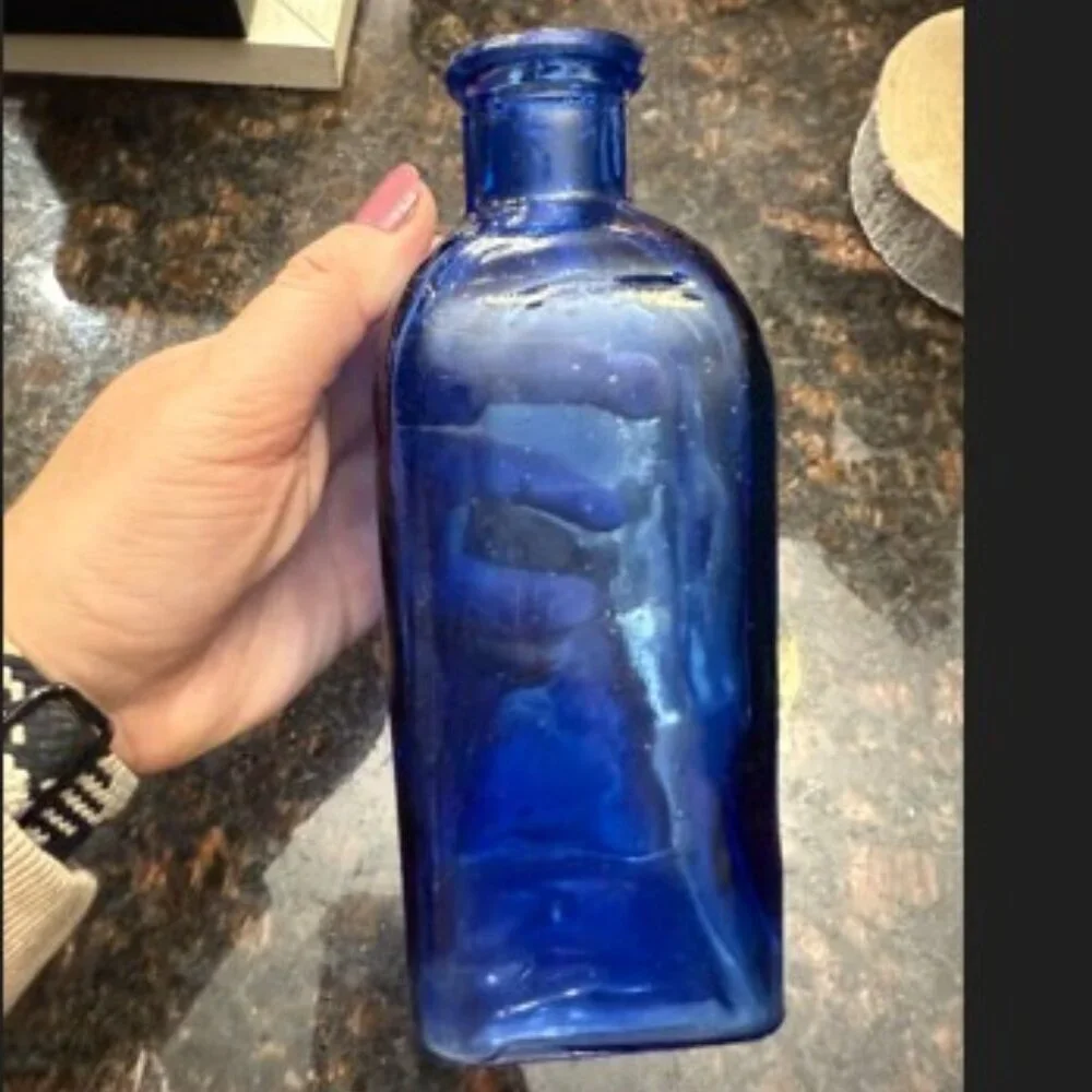 Blue glass decor/vase/pitcher - very pretty!